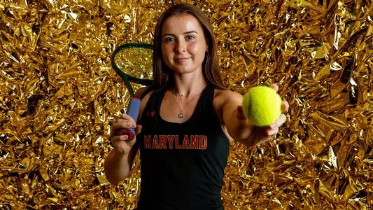 Danielle Hack Gold Background