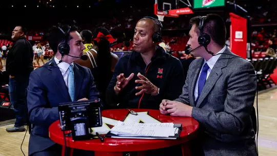 Nathan Schwartz and Ryan Martin with Barry P. Gossett Director of Athletics Damon Evans