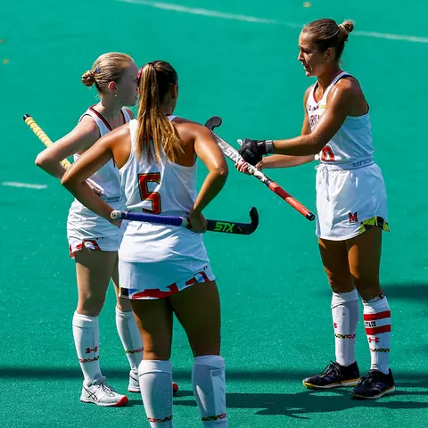 Emma DeBerdine shares some insight with freshman during a 2024 game