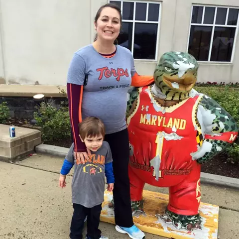 Bria Collins with her child at XFINITY Center