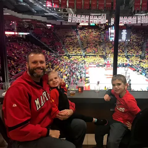 John Collins with his children at XFINITY Center