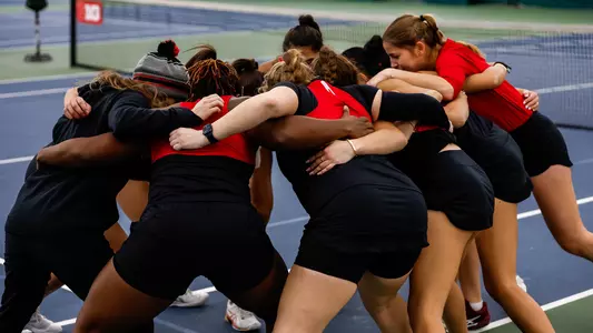 Women's Tennis Team Huddle