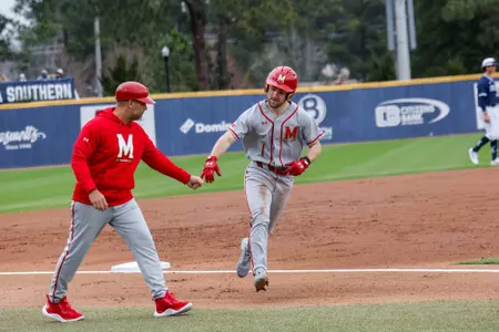 Jacob Orr Celebrates with Matt Swope at Third Base