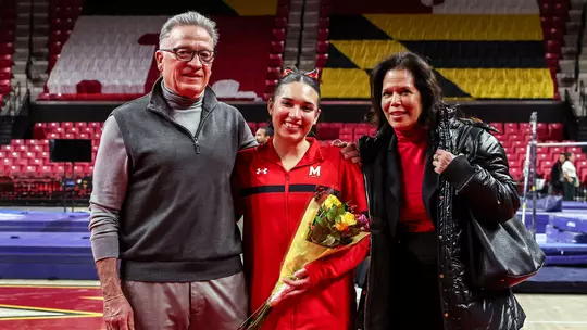 Alexa Rothenbuescher with her family on Senior Day