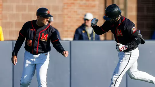 Matt Swope congratulates Chris Hacopian after hitting a home run