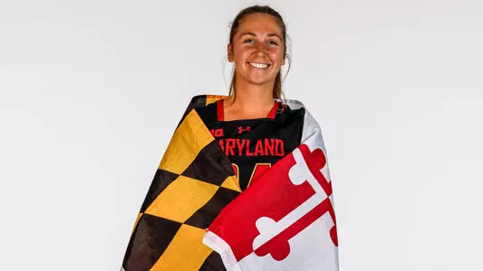Shaylan Ahearn posed with Maryland flag