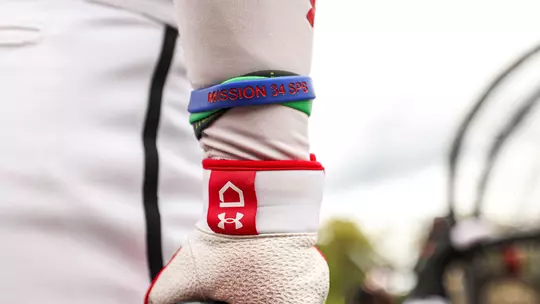 Charlie Glennon wearing a Mission 34 wristband