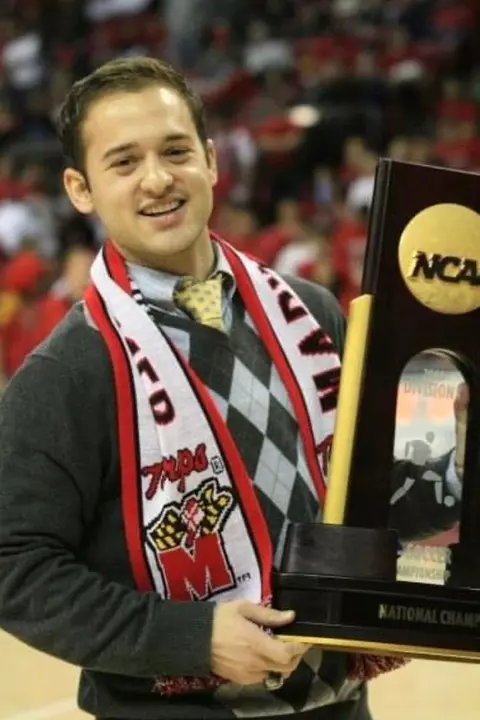 Michael Marchiano holding the 2008 NCAA Championship trophy