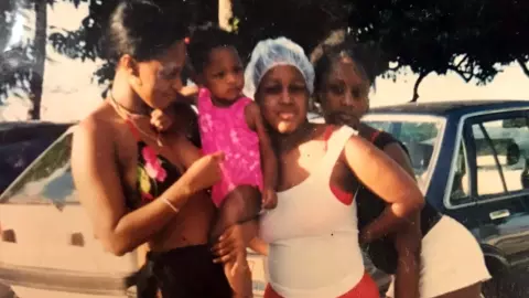 Kayla Thorpe as a child with her family