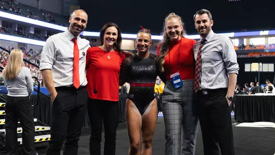 Emma Silberman and Maryland gymnastics coaches at the 2024 NCAA Championships