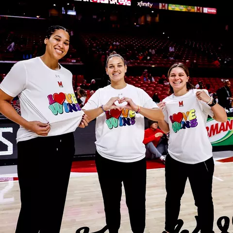 Maryland women's basketball staff wearing Pride shirts during the team's 2023-24 Pride Game