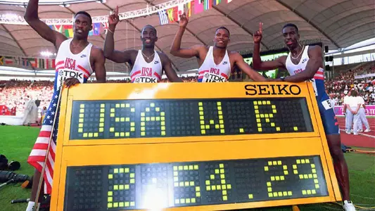 Andrew Valmon with the World Record-setting 4x400 relay team at the 1993 World Championships