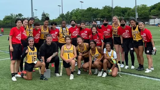 Sammi Woods with her flag football team