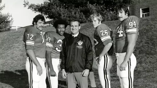 Jerry Claiborne with Paul Vellano, Louis Carter, Bob Smith, and Randy White, circa 1973