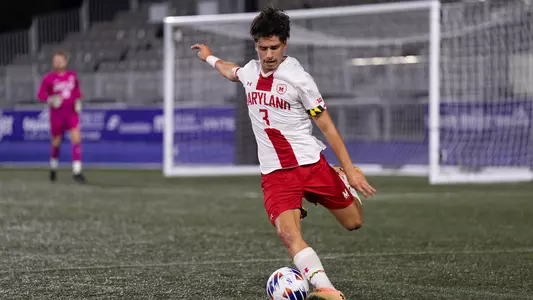 Luca Costabile clears ball out of defensive half