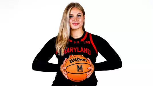 Allie Kubek white background black uniform