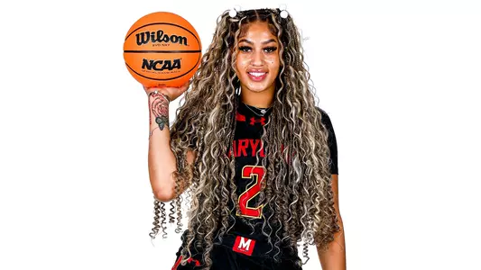 Kaylene Smikle black uniform white background