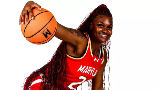 Bri McDaniel red uniform white background