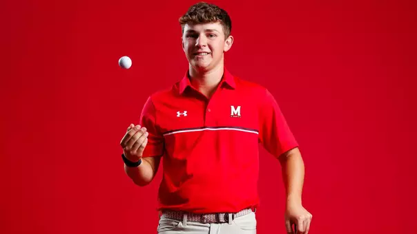 Griffin Barke posed red background