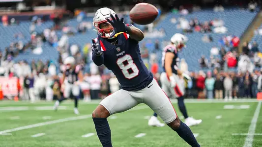Stefon Diggs catches a football for the Patriots