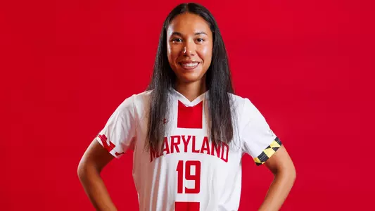 Symone Jenson Posed Red Background