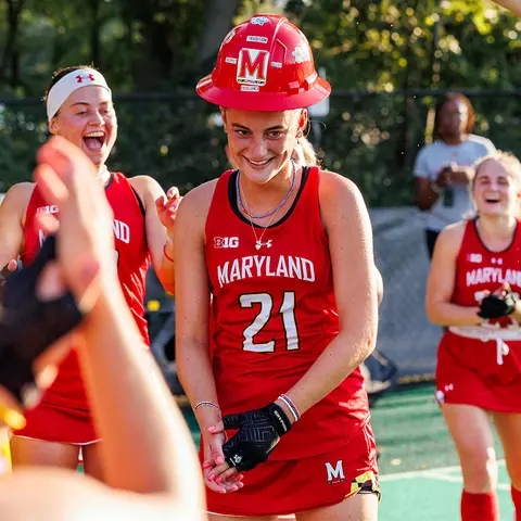 Djuna Eikelboom wearing The Hard Hat after a Maryland field hockey victory.
