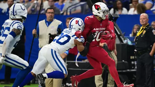 Nick Cross tackles Josh Sweat