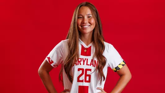 Eva Mowery Posed Red Background