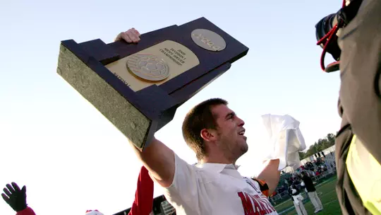 Jason Garey with the NCAA Championship trophy