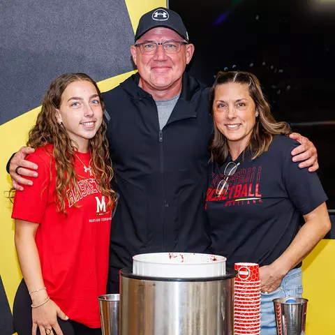 Buzz Williams with his daughter and his wife