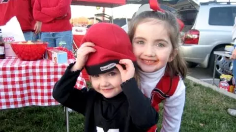 Brooke Martin as a child at a Maryland football tailgate