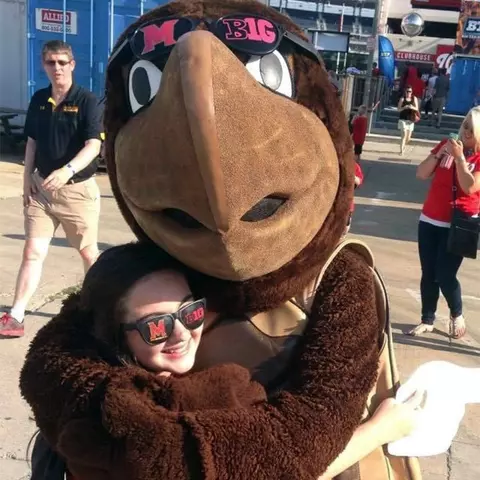 Brooke Martin hugging Testudo