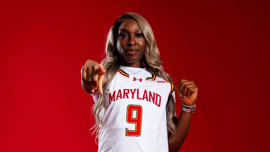 Isi ozzy-Momodu posed red background