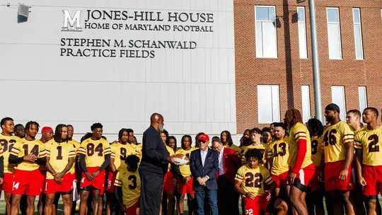 Michael Locksley and the Maryland football team with Steve Schanwald