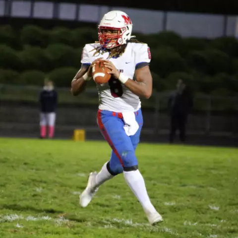 Cam Rice playing high school football