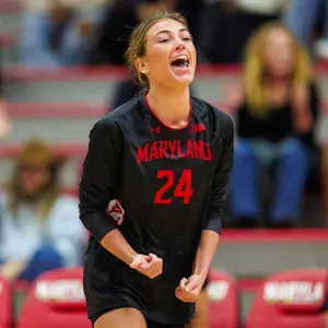 Ally Williams celebrating a point against Michigan