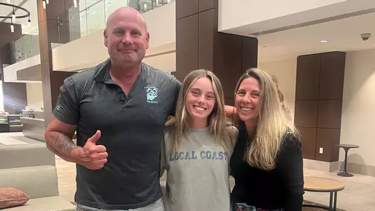 Bri Godfry with her uncle and her mother