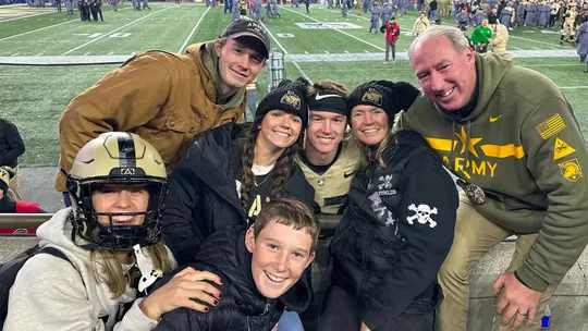 Ryan Reynolds with her family at an Army football game