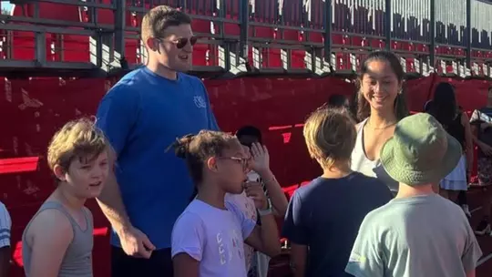 Joey Schneck at a Maryland Made event with children