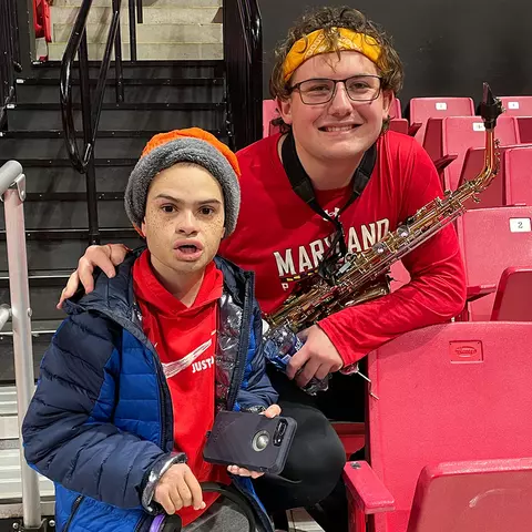 Zachary McFarland with a member of the Maryland pep band