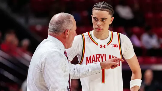 Buzz Williams and Darius Adams