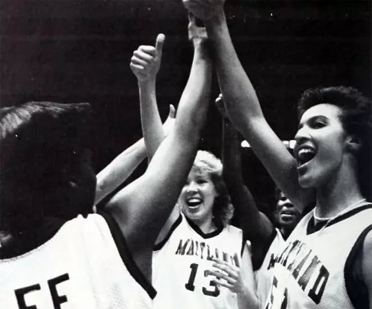 Christy Winters Scott celebrates with her teammates