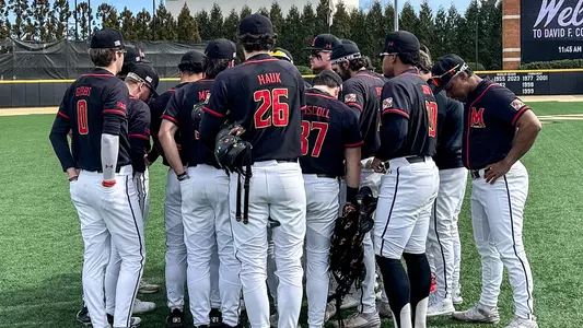 Team Huddle Before Friday's Series Opening Game Against Princeton