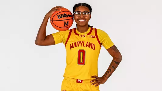 Shyanne Sellers gold uniform posed