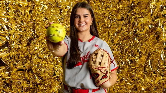 Grace Carrington gold backdrop