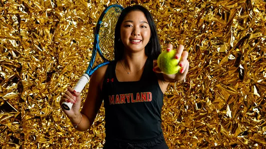 Katherine Hung Gold Posed Action