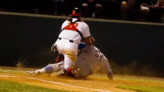 Kevin Martir tags out Darrell Miller Jr. at the plate on a throw from LaMonte Wade Jr.
