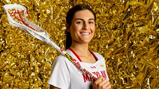 Kate Sites gold backdrop