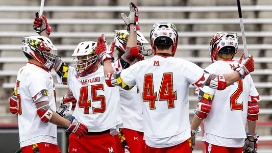 Men's Lacrosse team huddle