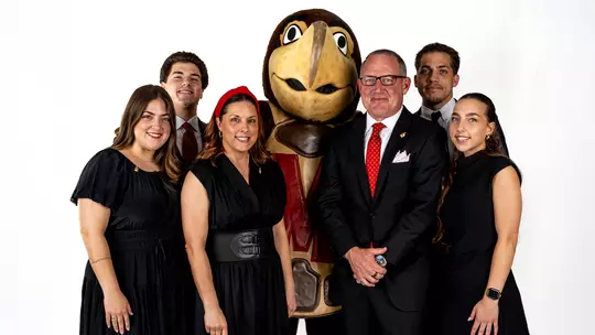 Buzz Williams with his family and Testudo